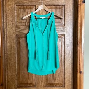 Sleeveless tank blouse with tassels